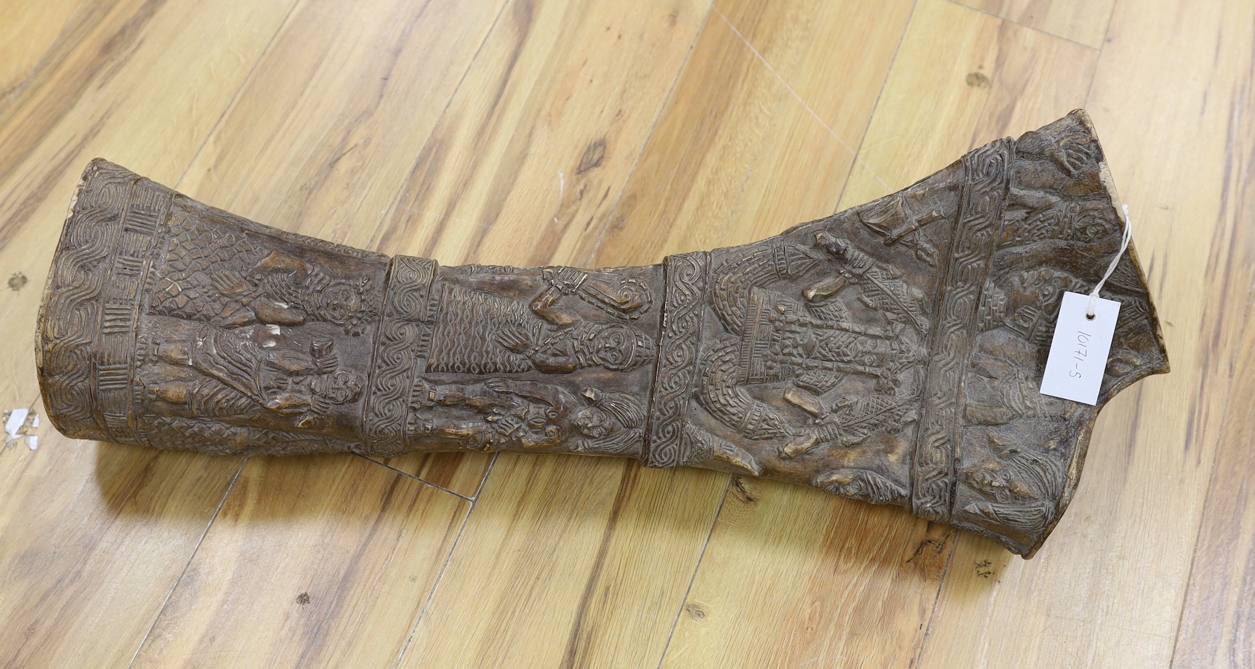 An unusual Benin style carved and incised elephant femur, Nigeria, 73cm high